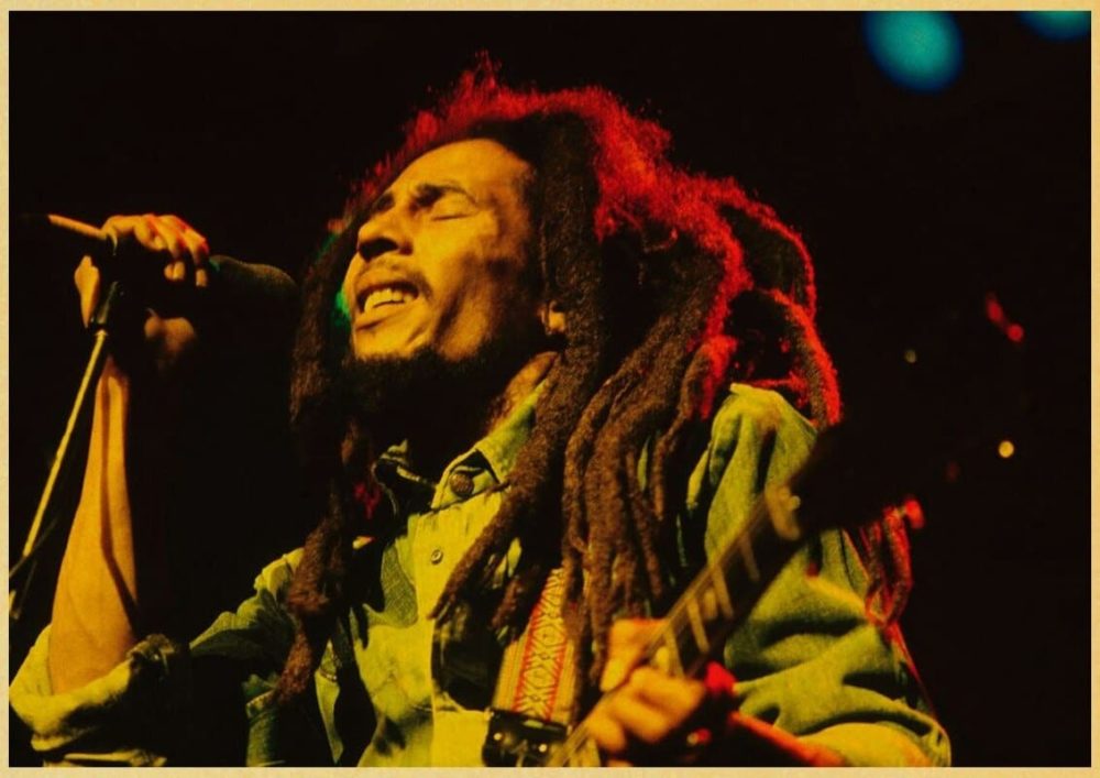 Affiche vintage de Bob Marley qui chante.