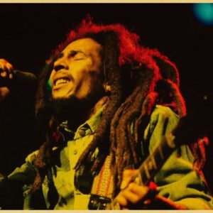Affiche vintage de Bob Marley qui chante.
