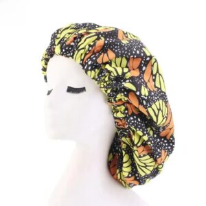 Bonnet Africain Coloré Extra Large mis sur un mannequin sur fond blanc