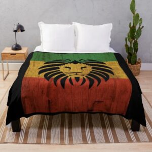 Plaid Rasta Safari Imprimé Lion installé sur un lit dans une chambre