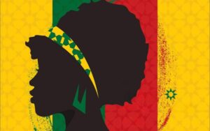 Drapeau jaune, vert, rouge, jaune en fond et une tête de femme afro en ombre noire, portant une boucle d'oreille verte et un bandeau dans les cheveux jaune et vert.